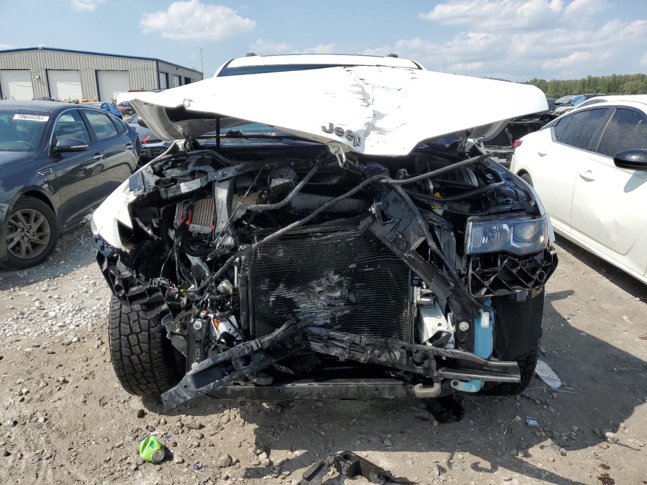 2017 Jeep Grand Cherokee VIN 1C4RJFAG1HC613600 Copart auction photo, front end damage thumbnail 5