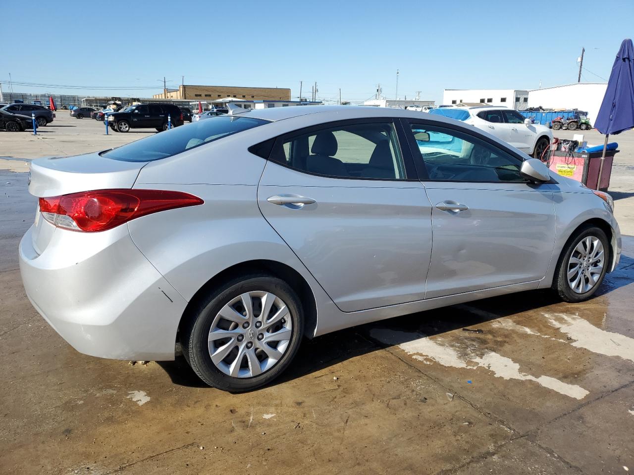 2012 Hyundai Elantra VIN KMHDH4AE1CU268690 Copart auction photo, side / front end damage thumbnail 3