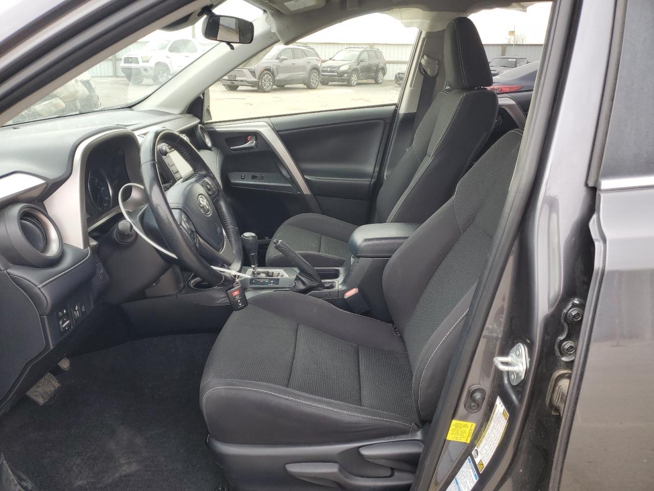 2018 Toyota RAV 4 VIN JTMRJREV6JD159466 Copart auction photo, side / rear end damage thumbnail 7