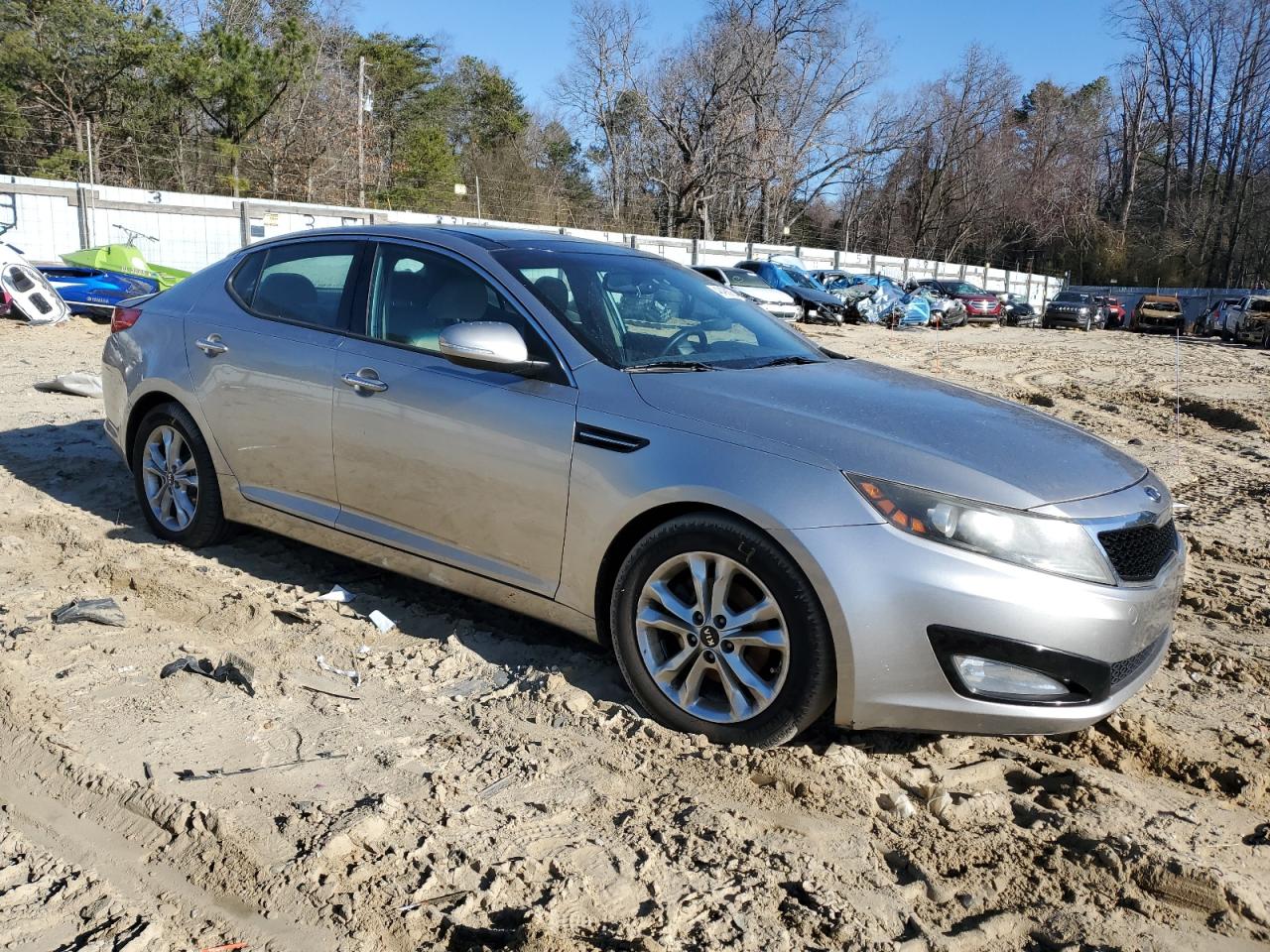 2011 KIA Optima VIN KNAGN4A72B5120694 Copart auction photo, rear end / minor dent/scratches damage thumbnail 4