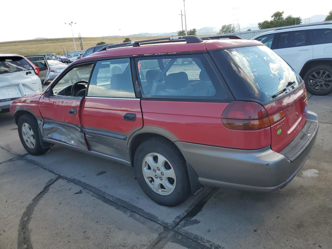 1999 Subaru Legacy VIN 4S3BG6856X7622773 Copart auction photo, side / front end damage thumbnail 2