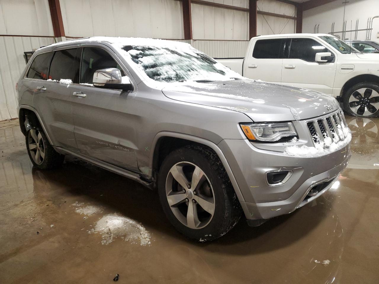 2015 Jeep Grand Cherokee VIN 1C4RJFCG3FC955558 Copart auction photo, side damage thumbnail 4