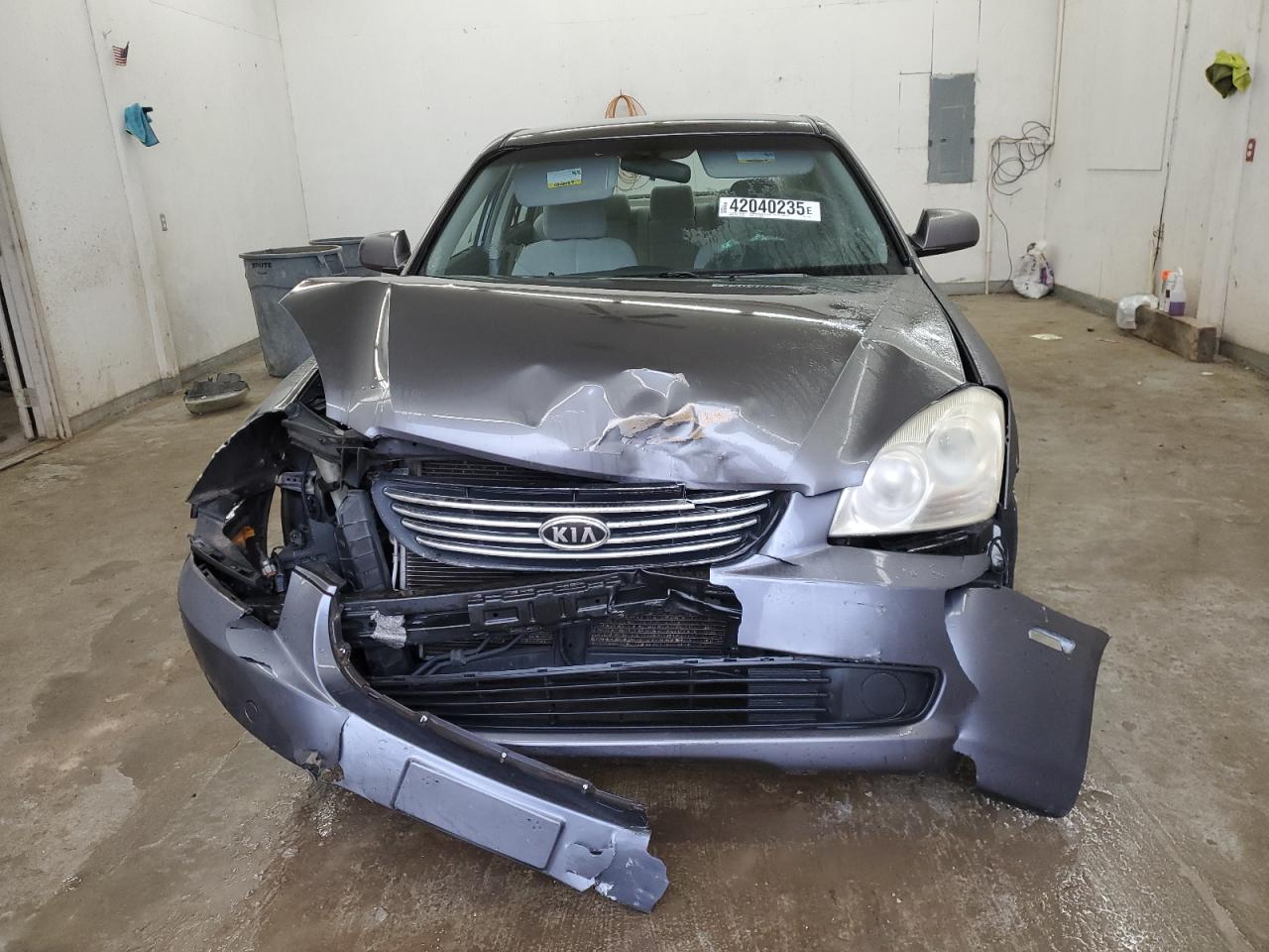 2007 KIA Optima VIN KNAGE123175147032 Copart auction photo, front end damage thumbnail 5