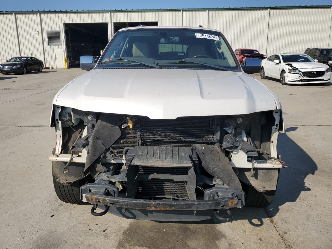 2015 Lincoln Navigator VIN 5LMJJ3HT2FEJ09596 Copart auction photo, front end / rear end damage thumbnail 5