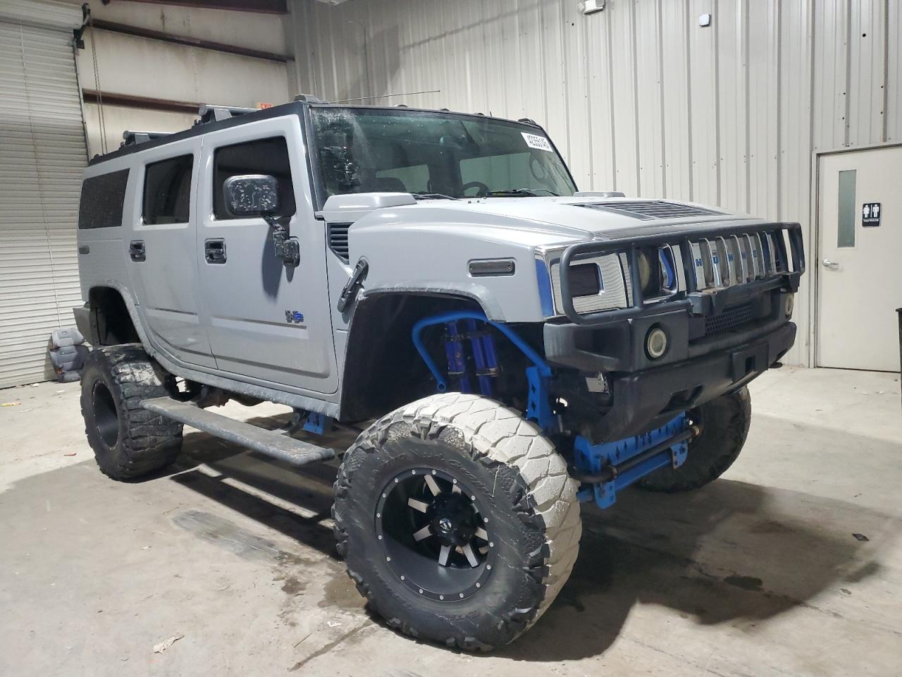 2003 Hummer H2 VIN 5GRGN23UX3H121083 Copart auction photo, minor dent/scratches damage thumbnail 4