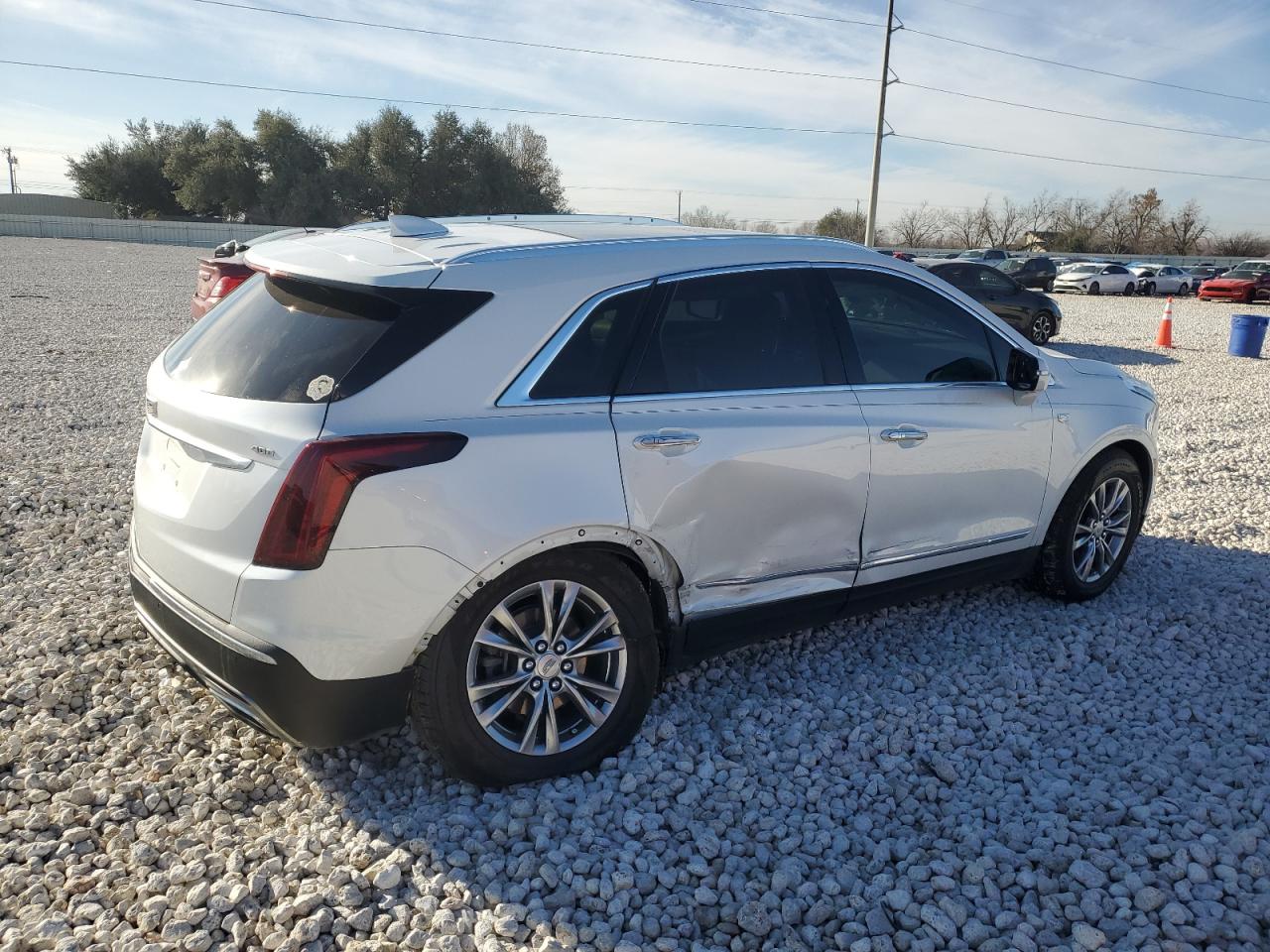2022 Cadillac XT5 VIN 1GYKNCRS1NZ125487 Copart auction photo, side damage thumbnail 3