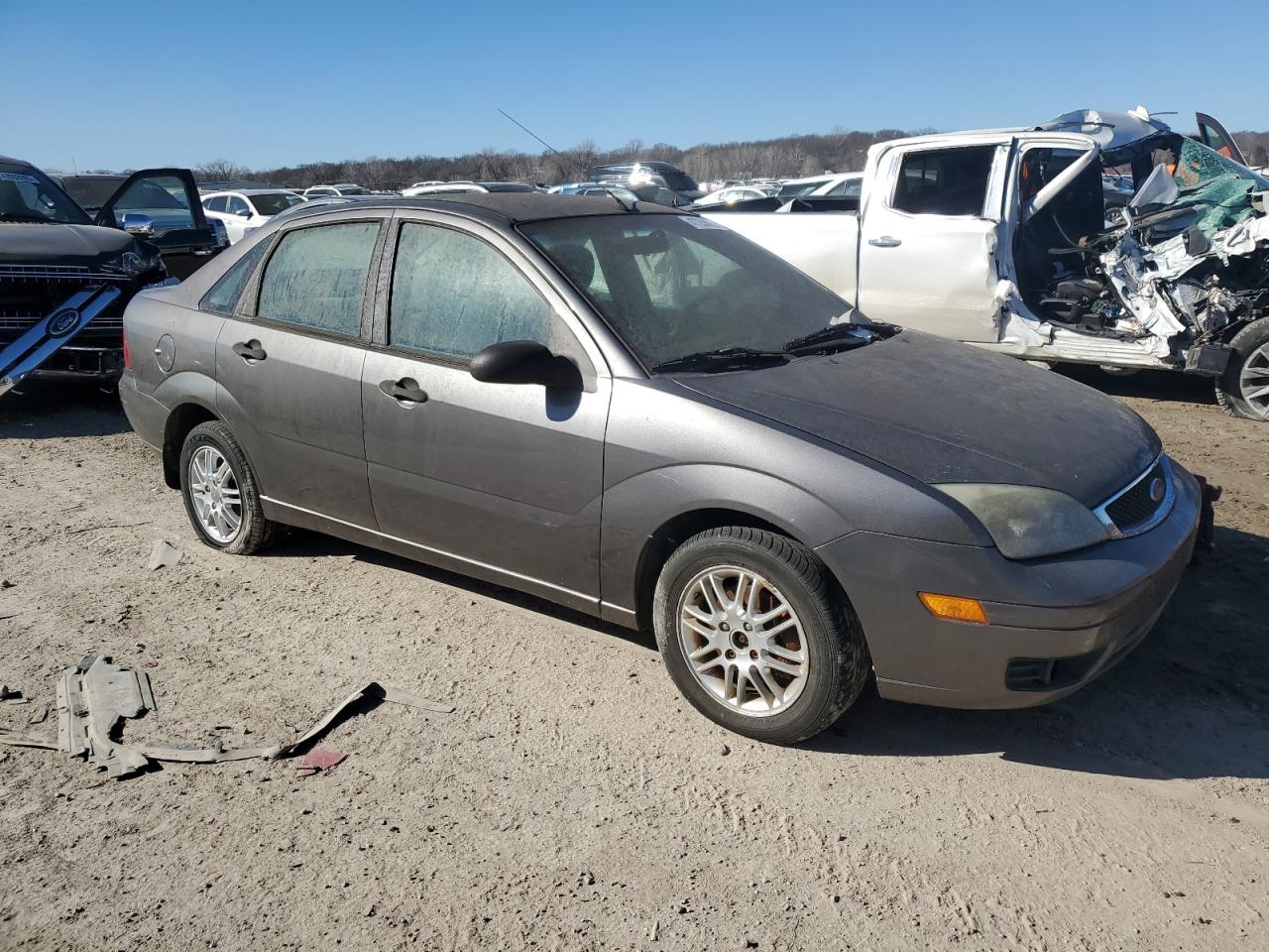 2007 Ford Focus VIN 1FAHP34N77W243677 Copart auction photo, normal wear damage thumbnail 4