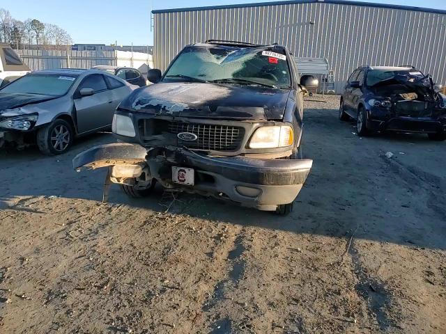 2000 Ford Expedition VIN 1FMRU1668YLA68761 Copart auction photo, all over damage thumbnail 12