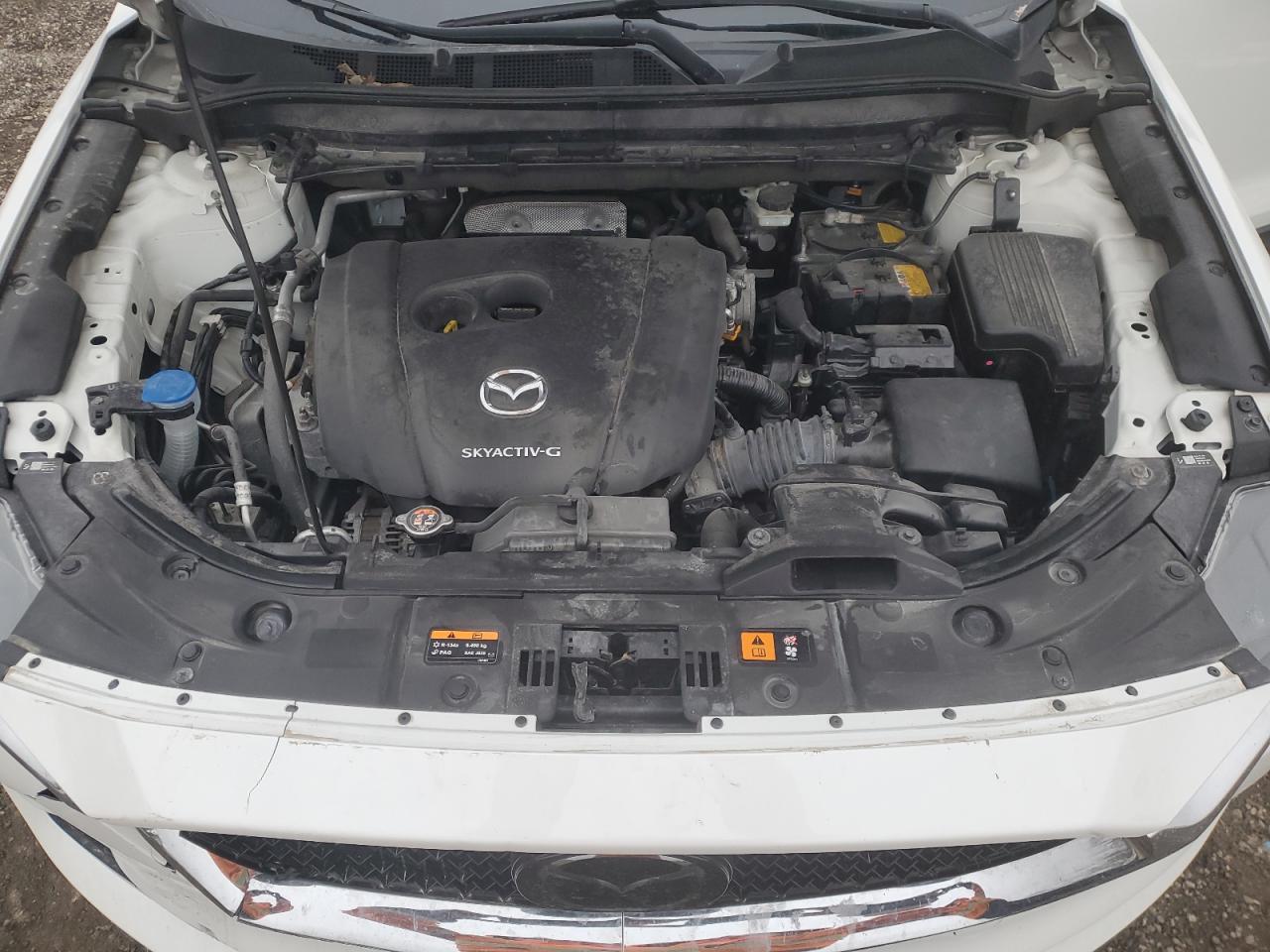 2021 Mazda CX-5 VIN JM3KFBCM3M0354769 Copart auction photo, all over damage thumbnail 12