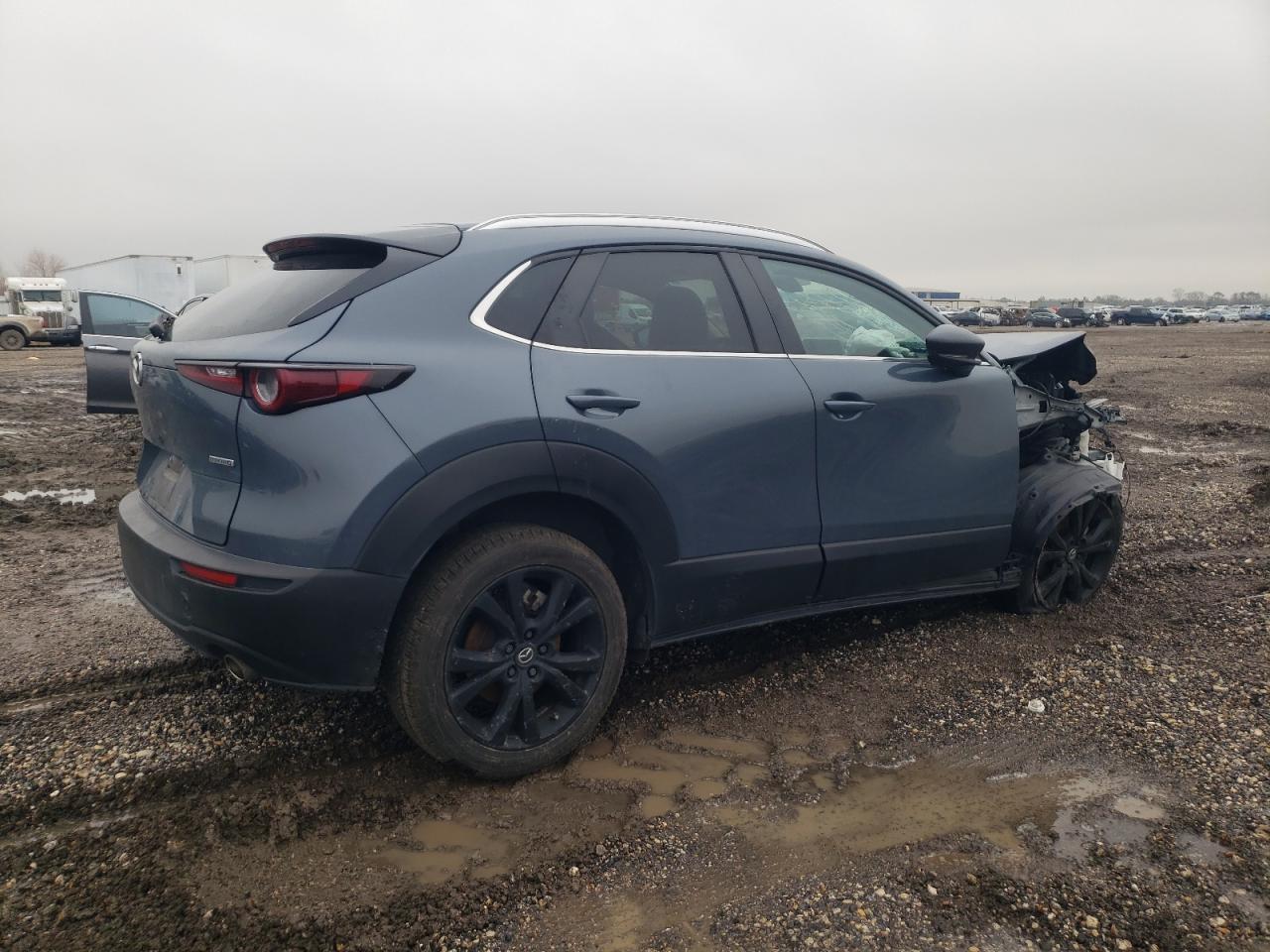 2023 Mazda CX-30 VIN 3MVDMBCM8PM546776 Copart auction photo, front end / undercarriage damage thumbnail 3