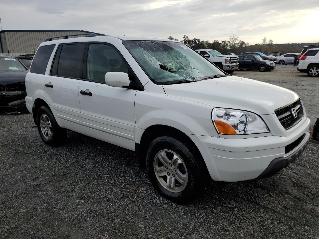 2003 Honda Pilot VIN 2HKYF18563H556120 Copart auction photo, top/roof damage thumbnail 4