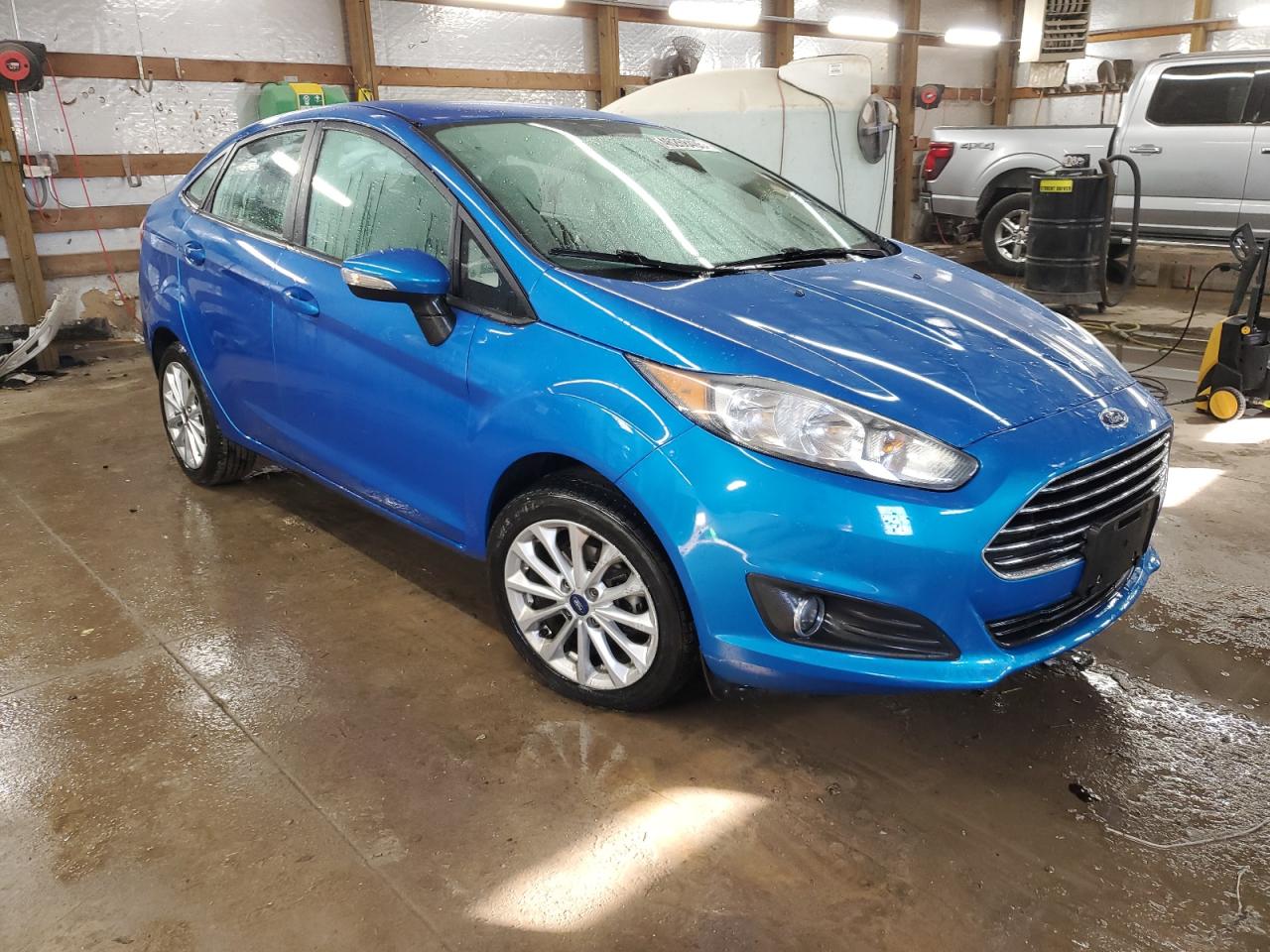 2014 Ford Fiesta VIN 3FADP4BJ1EM205606 Copart auction photo, undercarriage / minor dent/scratches damage thumbnail 4