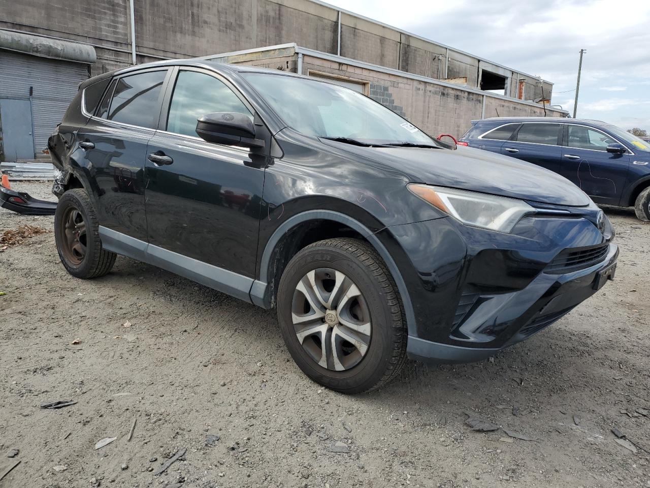 2017 Toyota RAV 4 VIN 2T3BFREV2HW678837 Copart auction photo, rear end / minor dent/scratches damage thumbnail 4
