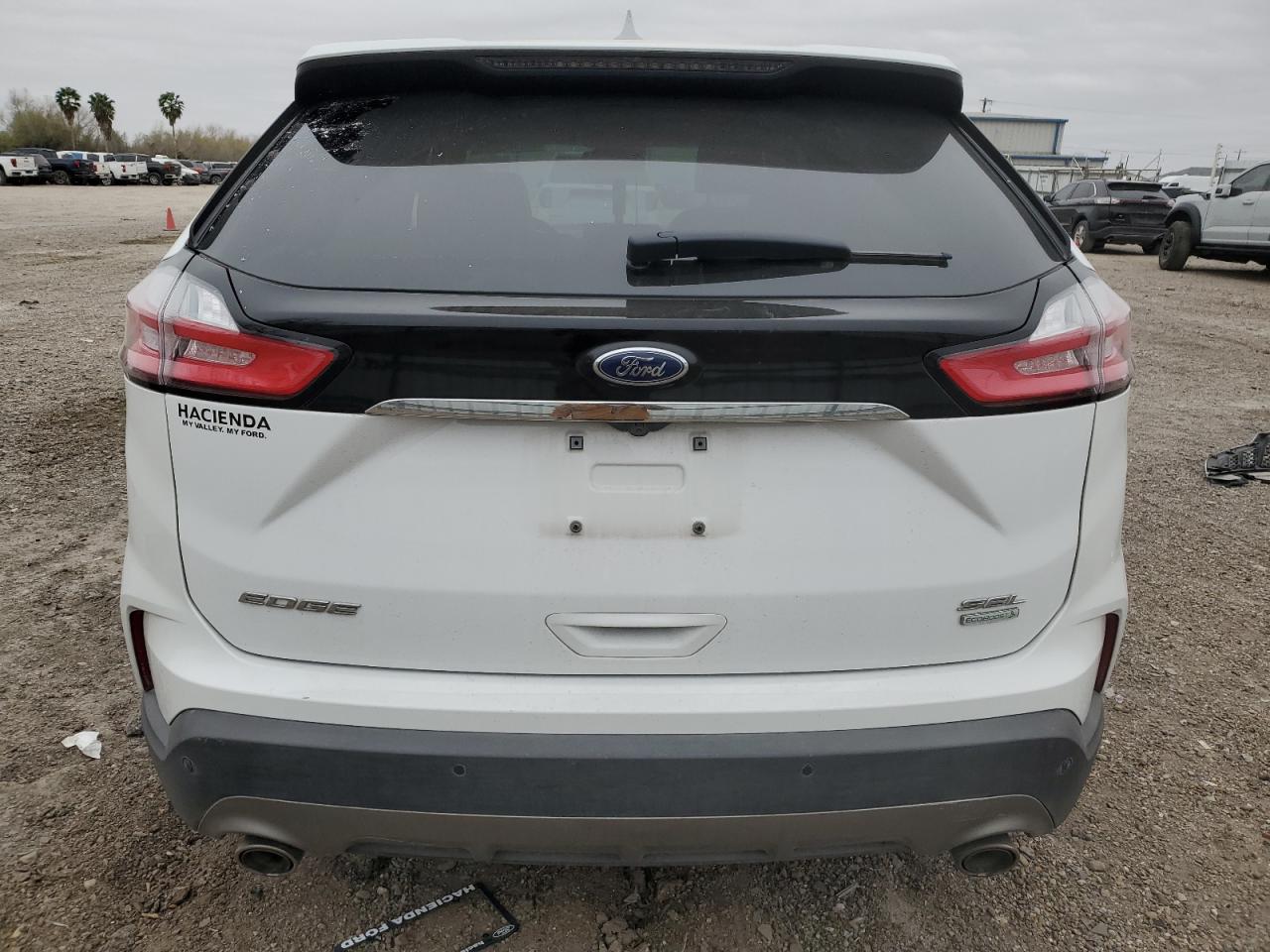 2020 Ford Edge VIN 2FMPK3J95LBA99002 Copart auction photo, front end / minor dent/scratches damage thumbnail 6