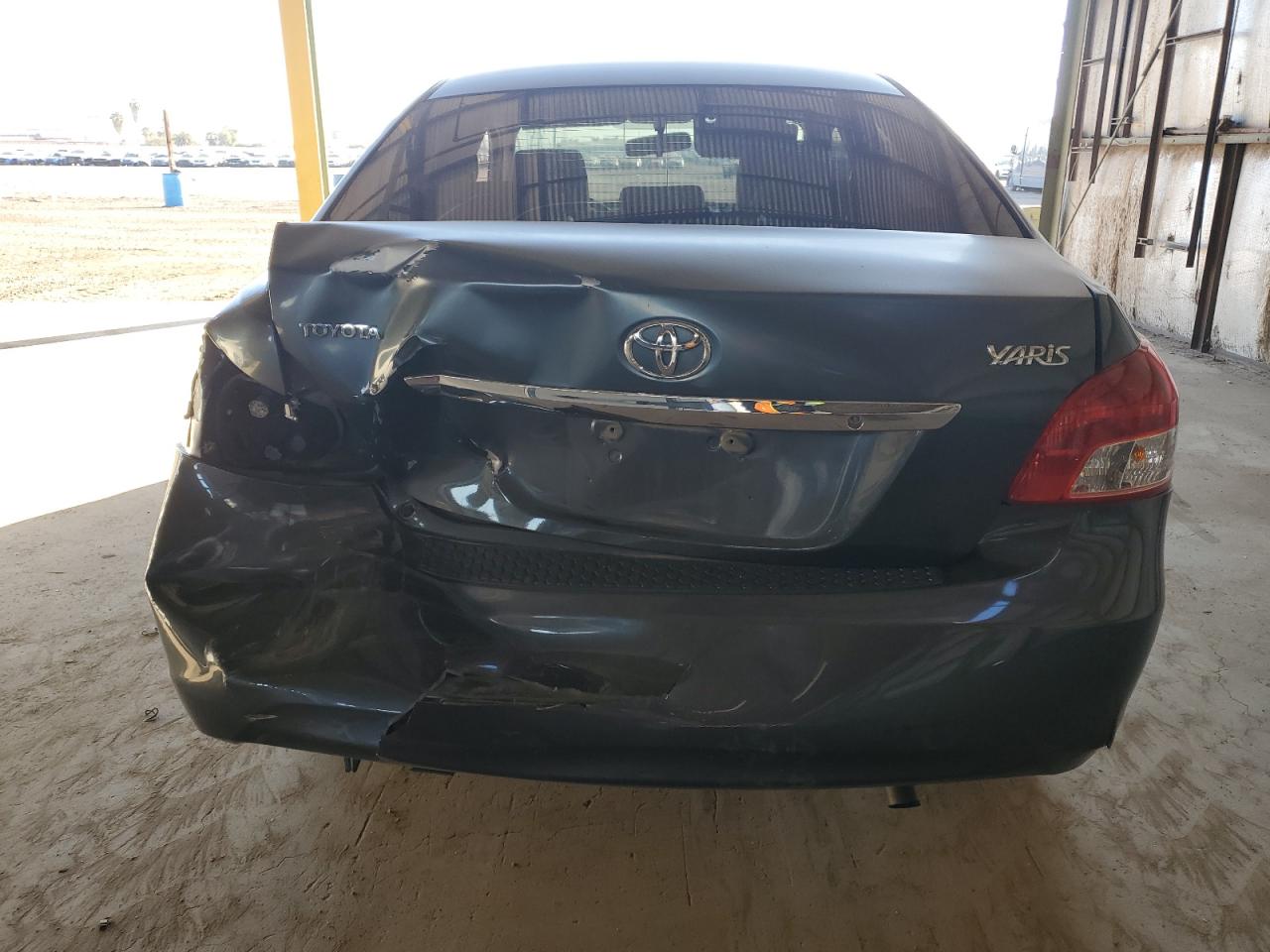 2007 Toyota Yaris VIN JTDBT923771012985 Copart auction photo, rear end damage thumbnail 6