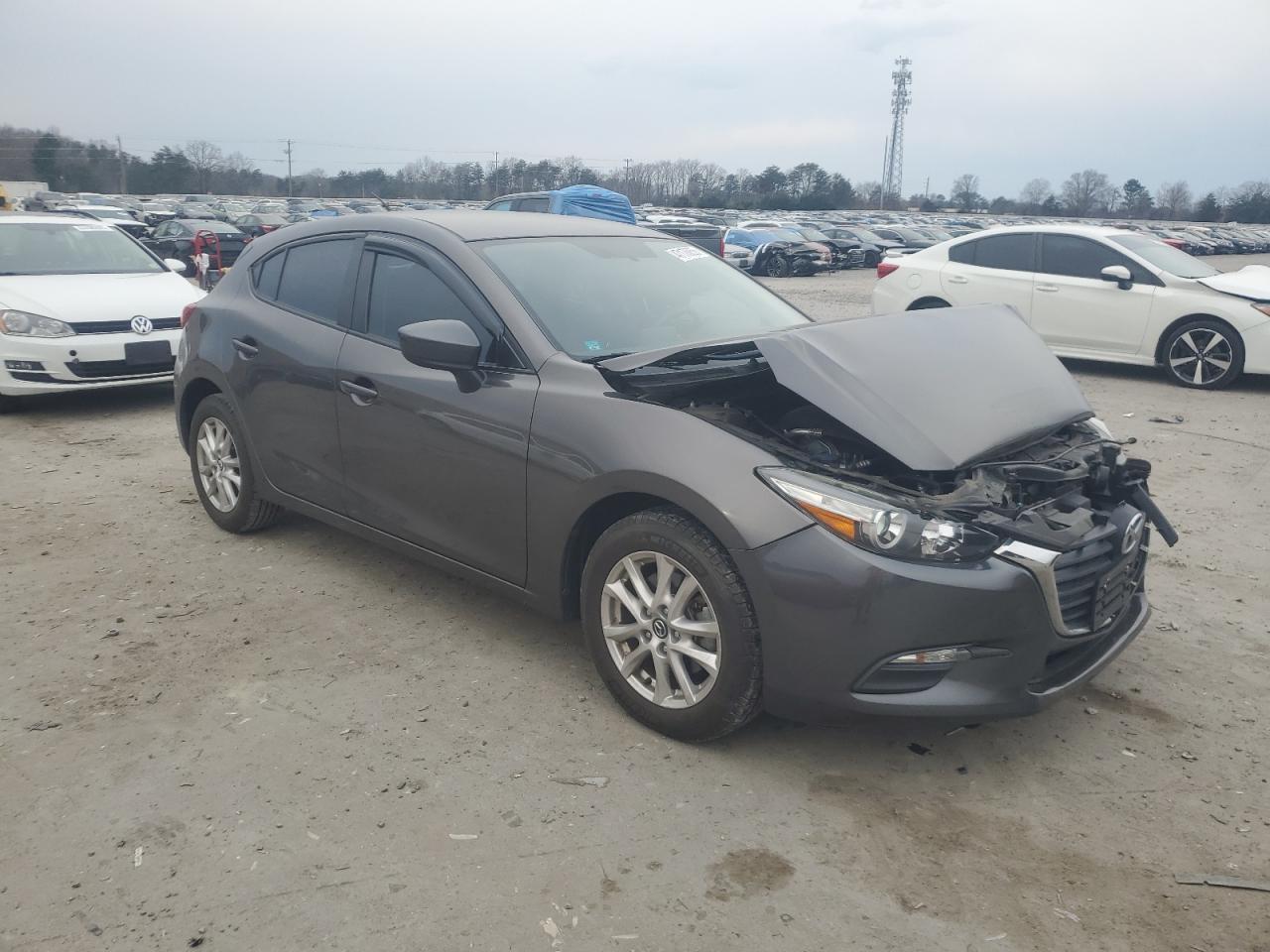 2017 Mazda 3 VIN 3MZBN1K7XHM100719 Copart auction photo, front end / minor dent/scratches damage thumbnail 4