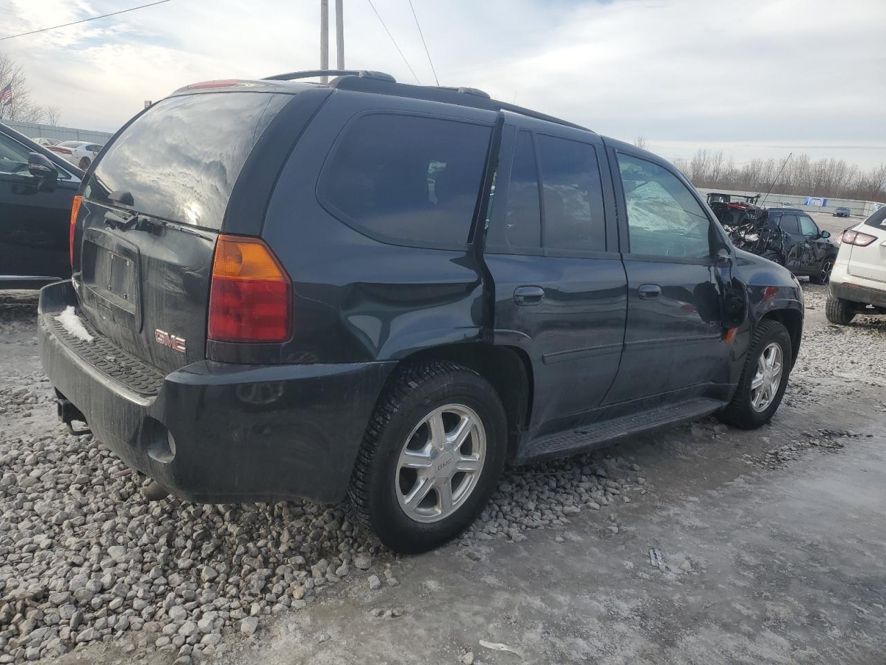 2005 GMC Envoy VIN 1GKET63M652353972 Copart auction photo, rollover damage thumbnail 3
