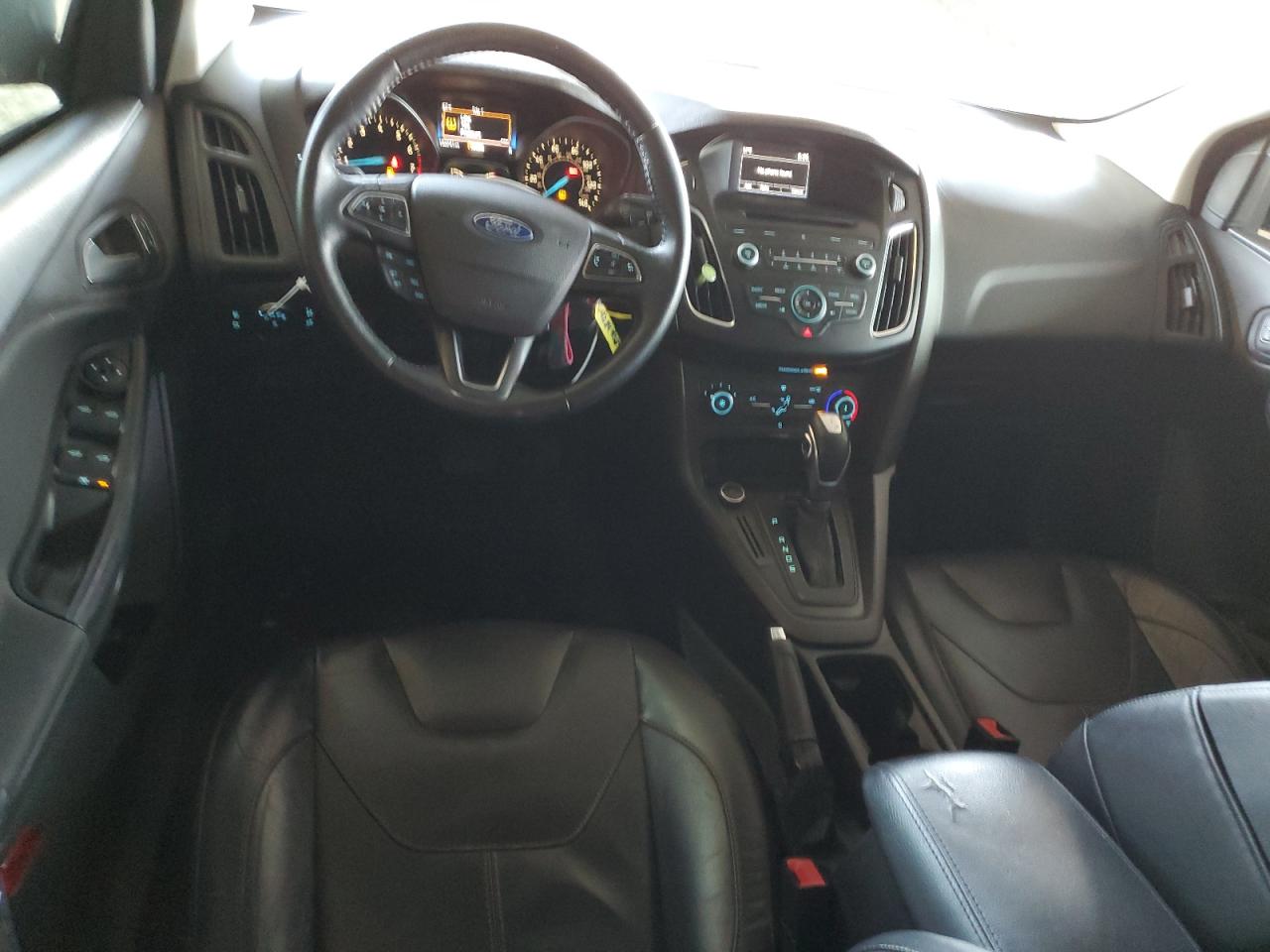 2015 Ford Focus VIN 1FADP3F2XFL275671 Copart auction photo, vandalism damage thumbnail 8