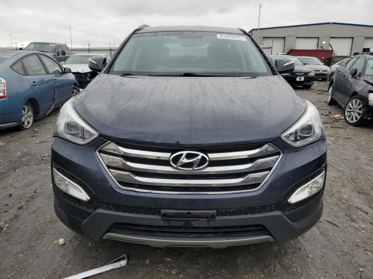 2014 Hyundai Santa Fe VIN 5XYZUDLB0EG212432 Copart auction photo, rear end damage thumbnail 5