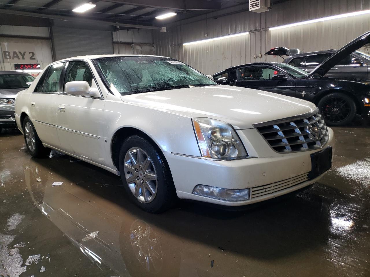 2009 Cadillac DTS VIN 1G6KD57YX9U126395 Copart auction photo, rear end damage thumbnail 4