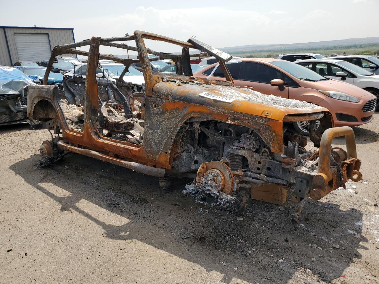 2014 Jeep Wrangler VIN 1C4BJWFG5EL100369 Copart auction photo, burn damage thumbnail 4