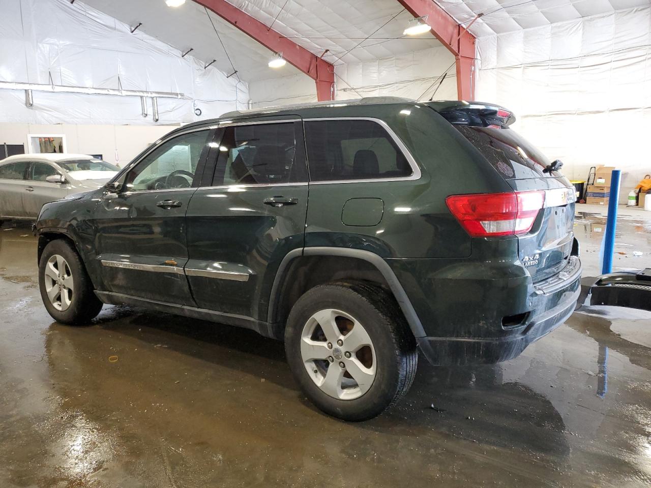 2011 Jeep Grand Cherokee VIN 1J4RR4GG5BC738458 Copart auction photo, front end / all over damage thumbnail 2
