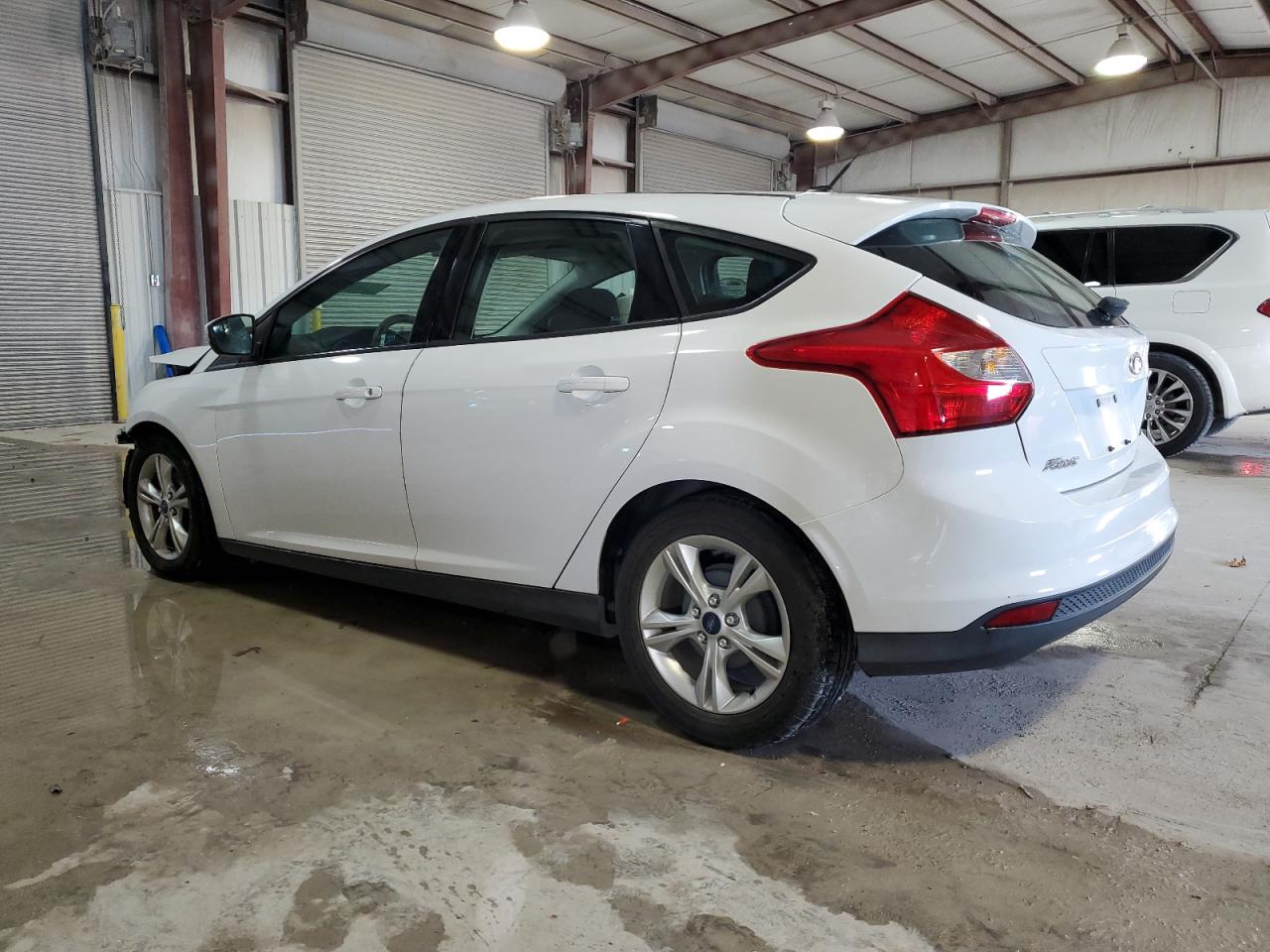 2014 Ford Focus VIN 1FADP3K21EL199584 Copart auction photo, front end / minor dent/scratches damage thumbnail 2