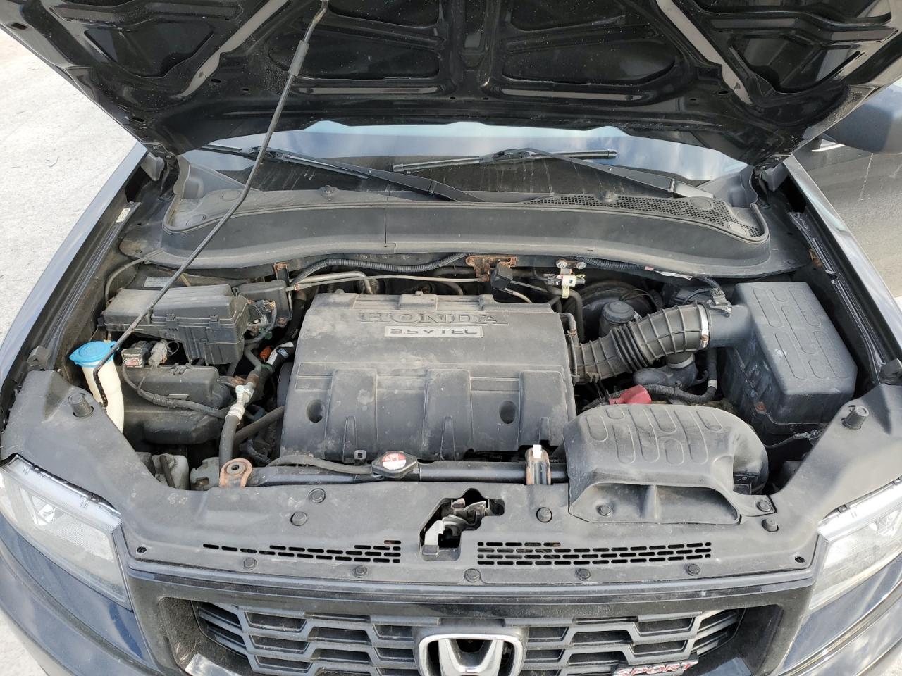 2013 Honda Ridgeline VIN 5FPYK1F70DB004569 Copart auction photo, rear end damage thumbnail 11