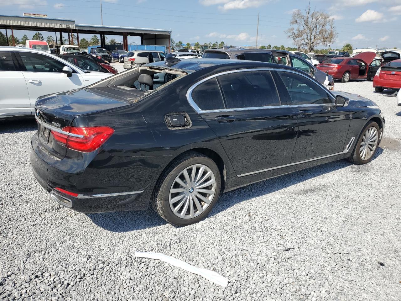 2019 BMW 7er VIN WBA7E2C38KB454843 Copart auction photo, front end / rear end damage thumbnail 3