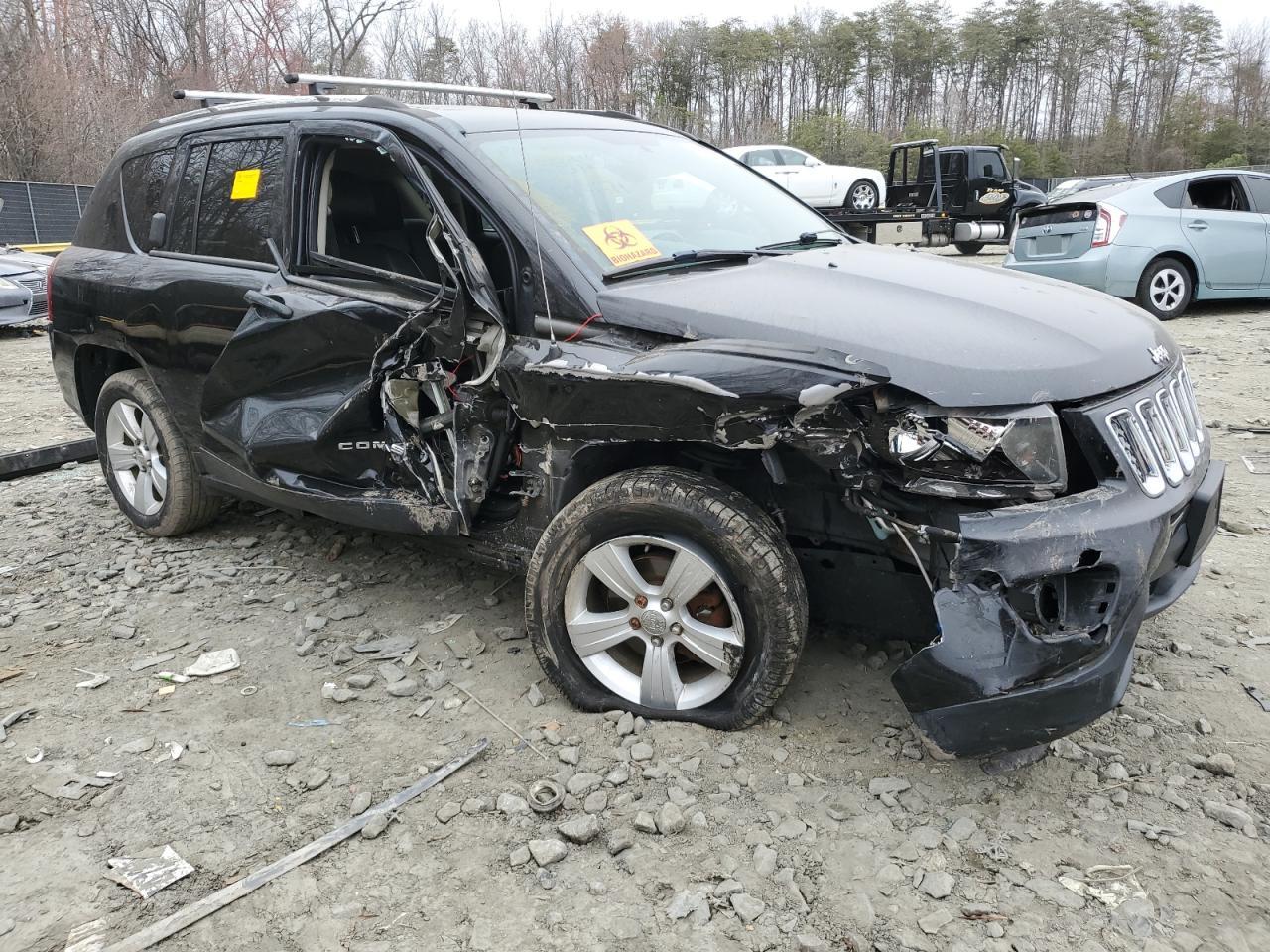 2014 Jeep Compass VIN 1C4NJDEB9ED623671 Copart auction photo, front end / side damage thumbnail 4