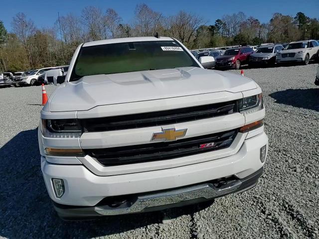 2018 Chevrolet Silverado VIN 3GCUKRECXJG156126 Copart auction photo, burn damage thumbnail 11