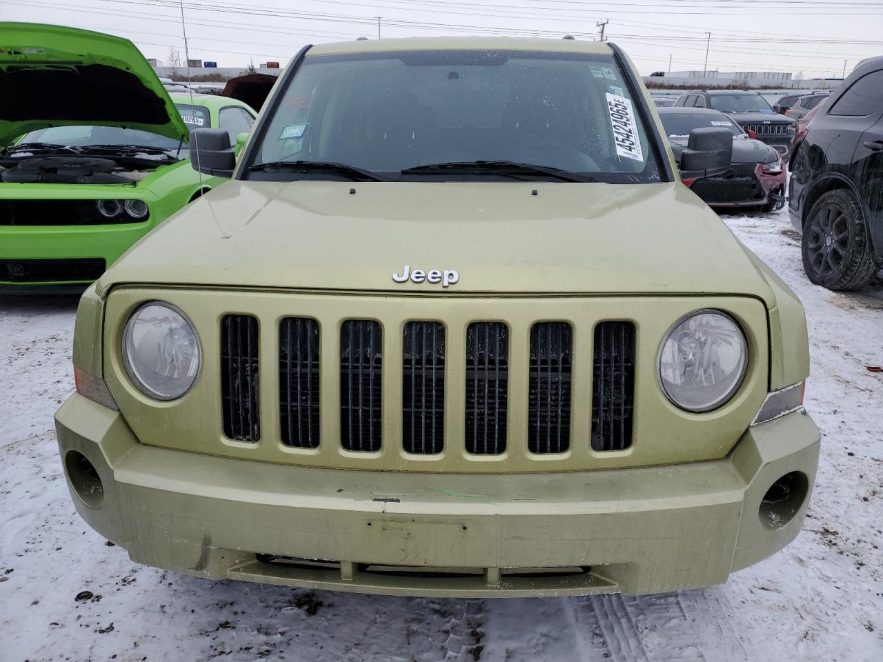 2010 Jeep Liberty (Patriot) VIN 1J4NT2GB6AD500944 Copart auction photo, side / minor dent/scratches damage thumbnail 5