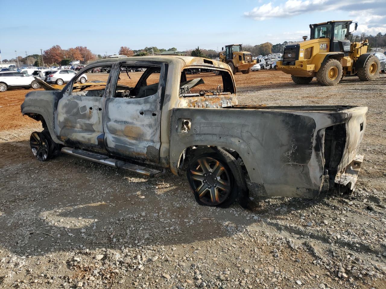2016 Toyota Tacoma VIN 3TMEZ5CN9GM006094 Copart auction photo, burn damage thumbnail 2