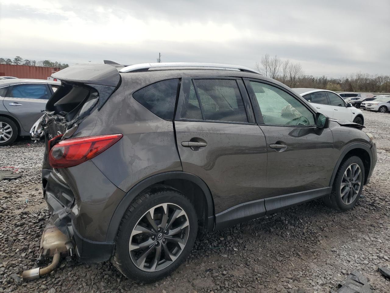 2016 Mazda CX-5 VIN JM3KE4DY6G0739747 Copart auction photo, rear end / front end damage thumbnail 3