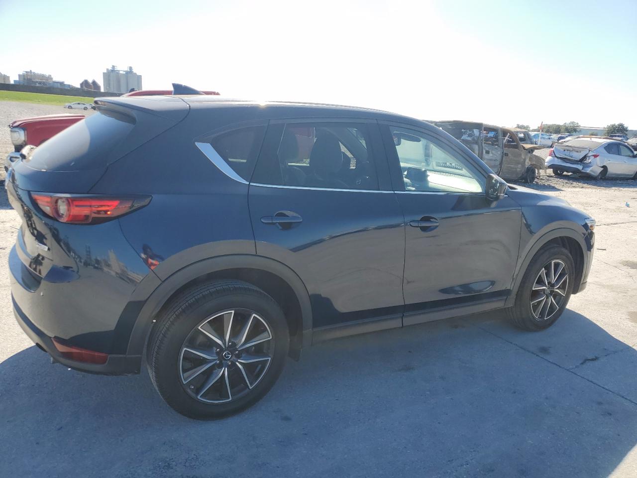 2017 Mazda CX-5 VIN JM3KFADL4H0207964 Copart auction photo, side damage thumbnail 3