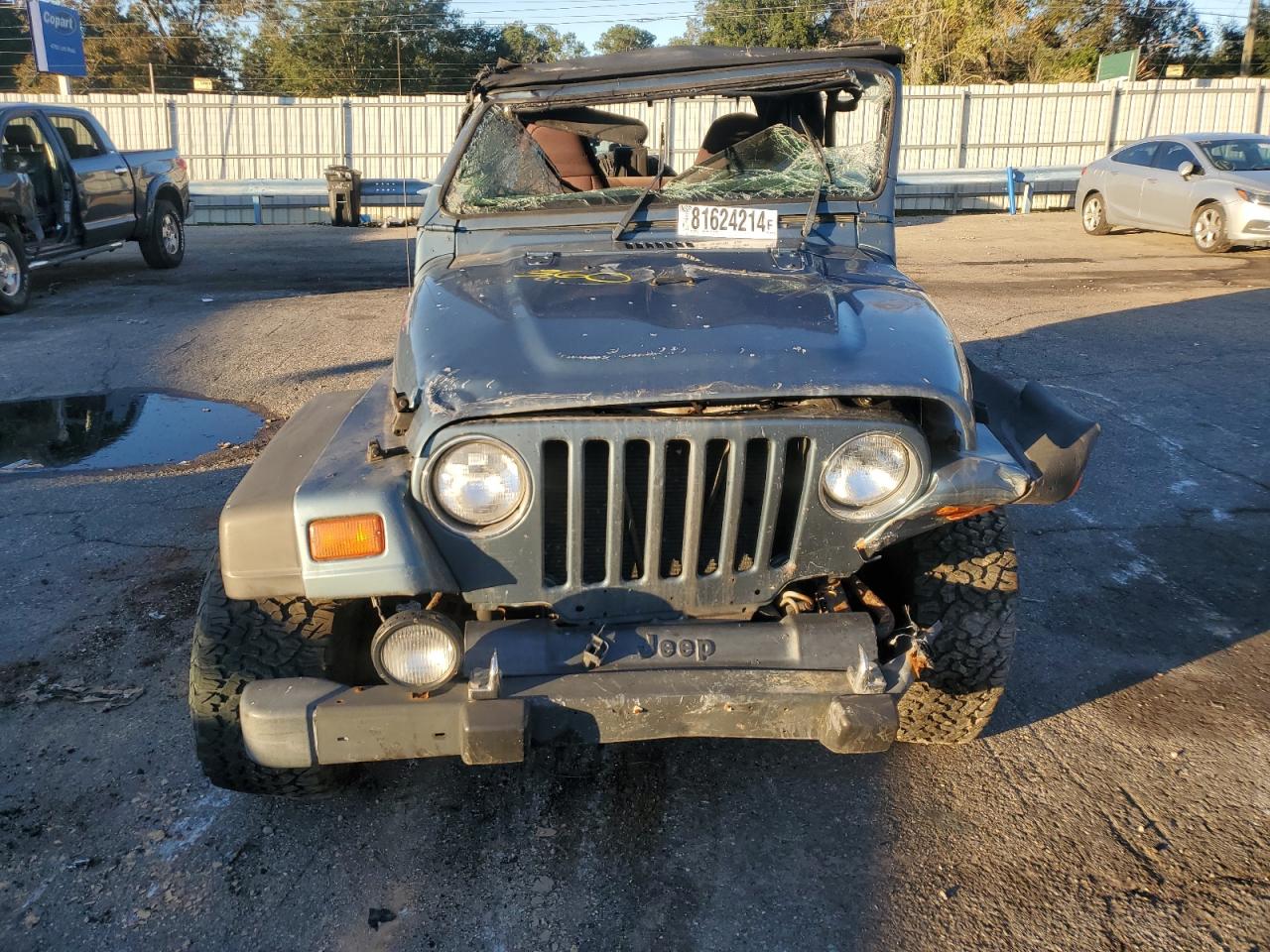 1999 Jeep Wrangler VIN 1J4FY19S5XP416036 Copart auction photo, rollover damage thumbnail 5