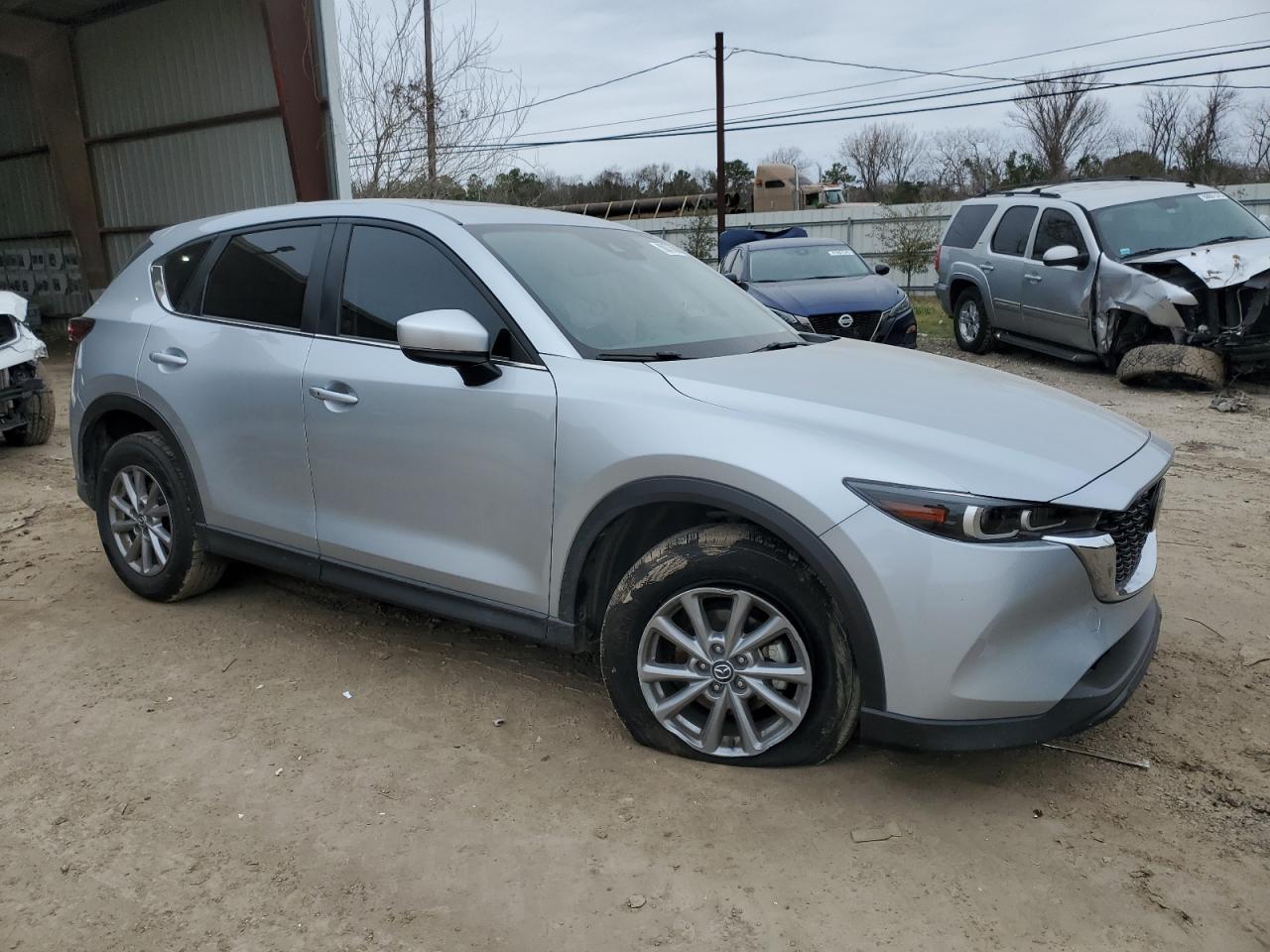 2023 Mazda CX-5 VIN JM3KFBCM4P0143875 Copart auction photo, frame damage / front end damage thumbnail 4