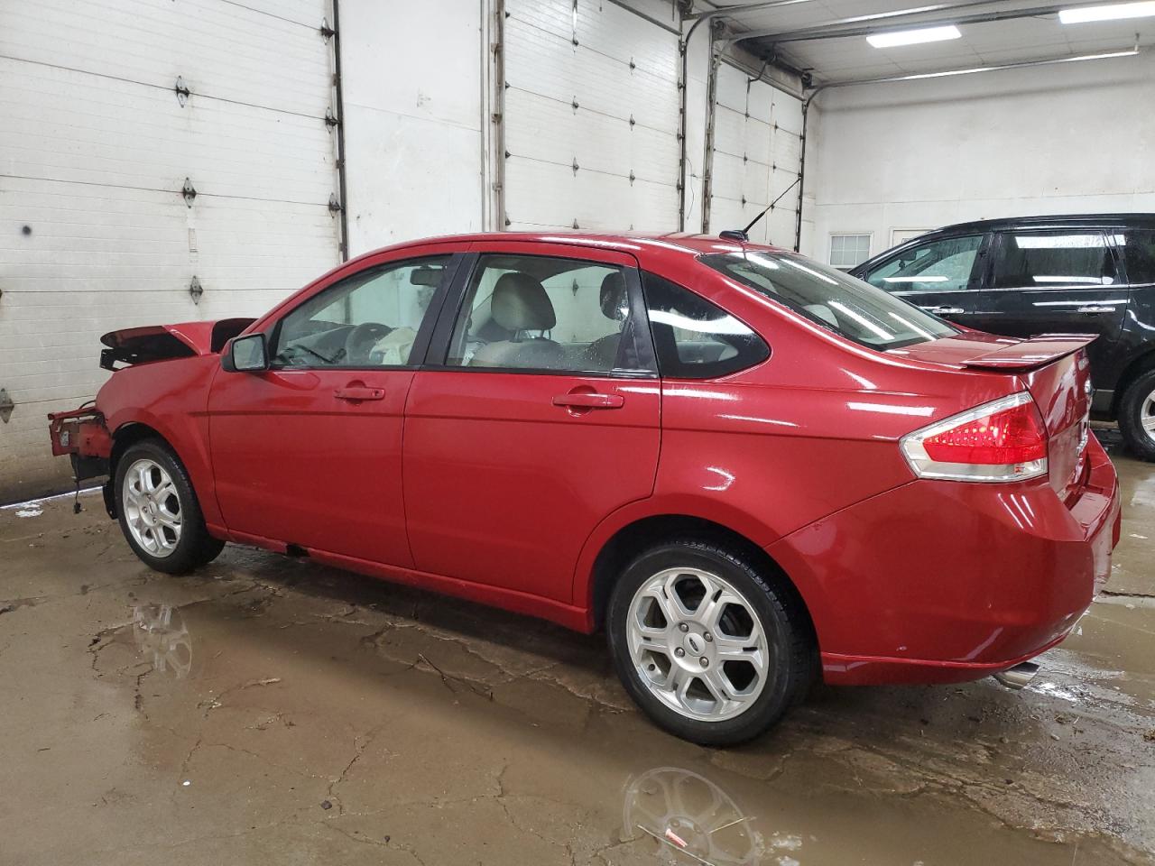 2009 Ford Focus VIN 1FAHP36N49W205002 Copart auction photo, front end / side damage thumbnail 2