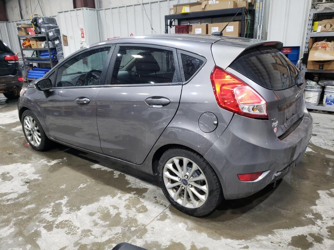 2014 Ford Fiesta VIN 3FADP4EJ6EM114181 Copart auction photo, rear end / front end damage thumbnail 2
