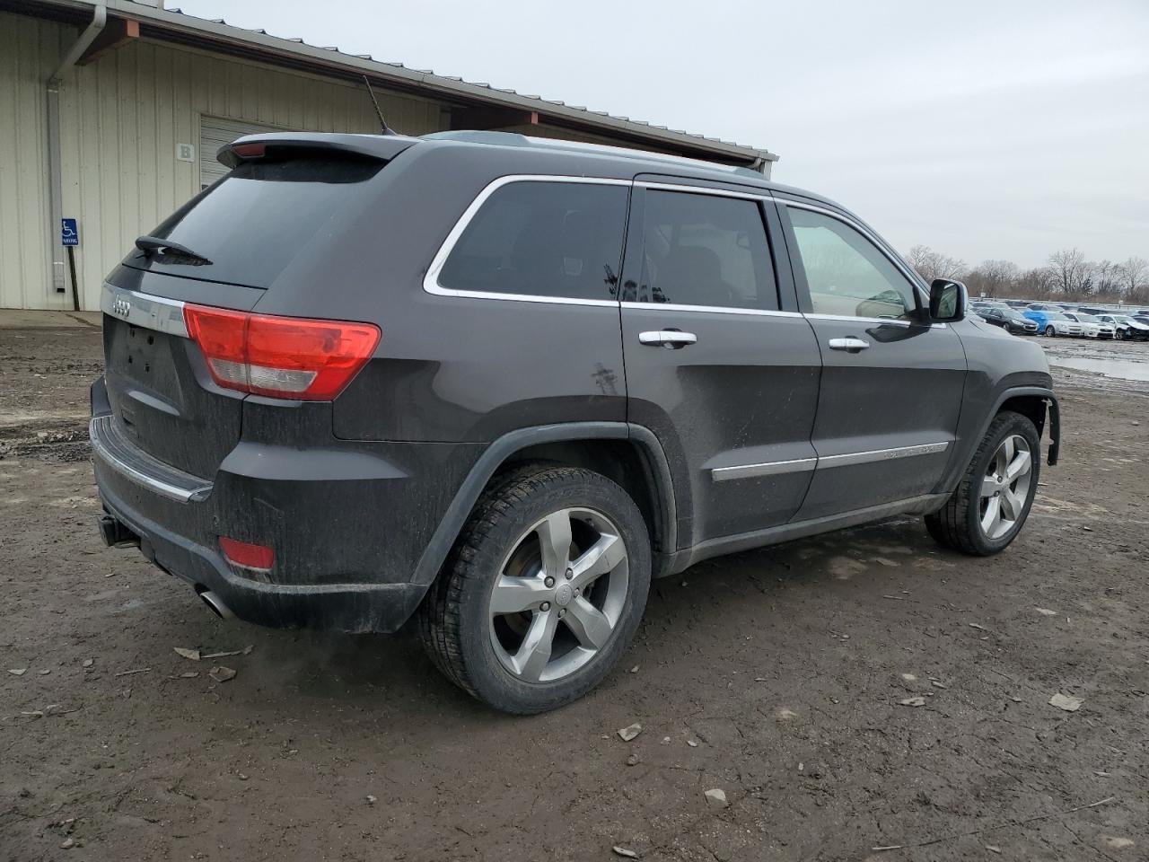 2011 Jeep Grand Cherokee VIN 1J4RR6GT0BC647333 Copart auction photo, front end / side damage thumbnail 3