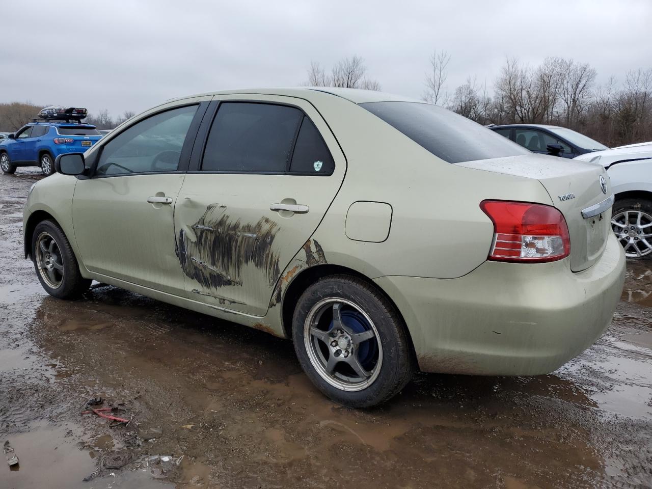 2007 Toyota Yaris VIN JTDBT923171089402 Copart auction photo, side damage thumbnail 2