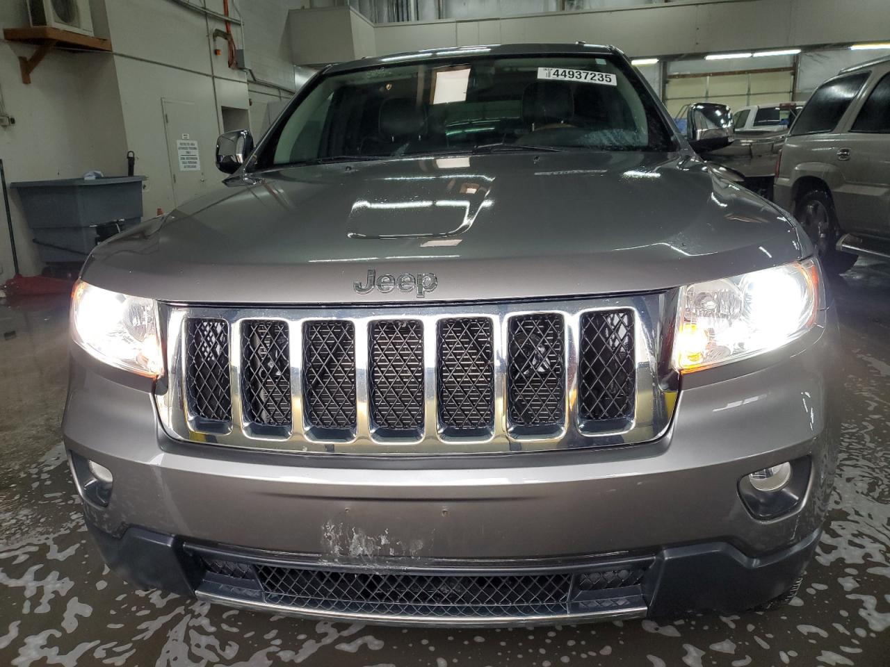 2012 Jeep Grand Cherokee VIN 1C4RJFCG6CC342314 Copart auction photo, rear end / side damage thumbnail 5