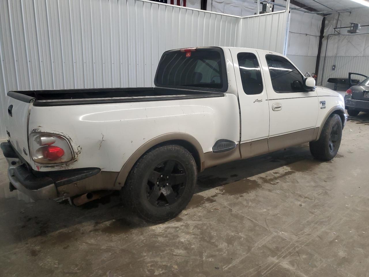 2003 Ford F-150 VIN 1FTRX07L93KC81128 Copart auction photo, burn - engine damage thumbnail 3