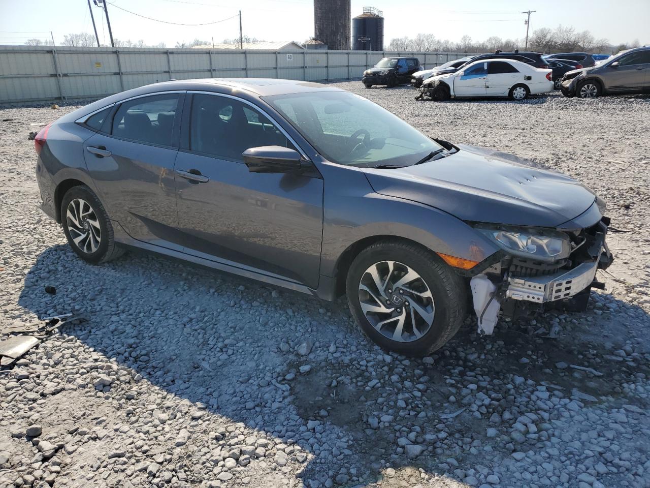 2017 Honda Civic VIN 19XFC2F7XHE005923 Copart auction photo, front end / side damage thumbnail 4