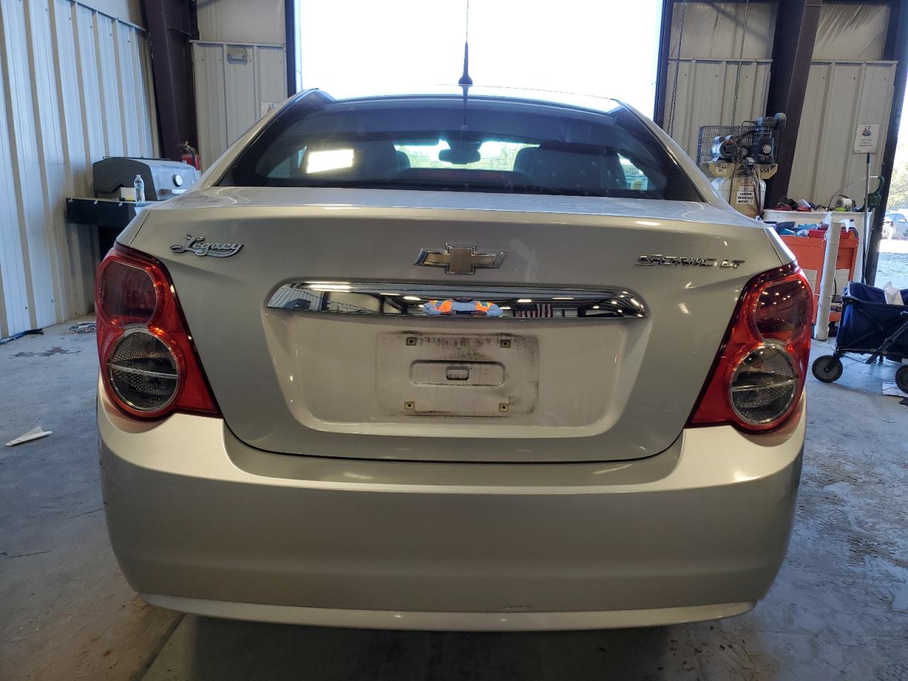 2013 Chevrolet Sonic VIN 1G1JC5SH6D4229172 Copart auction photo, rear end / minor dent/scratches damage thumbnail 6