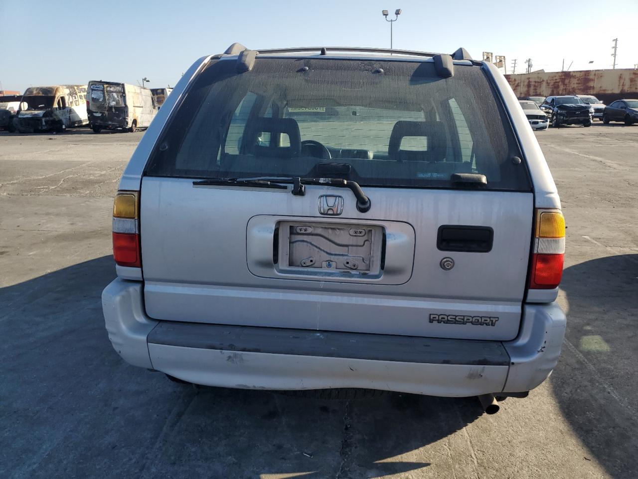 1999 Honda Passport VIN 4S6CK58W3X4414697 Copart auction photo, minor dent/scratches damage thumbnail 6