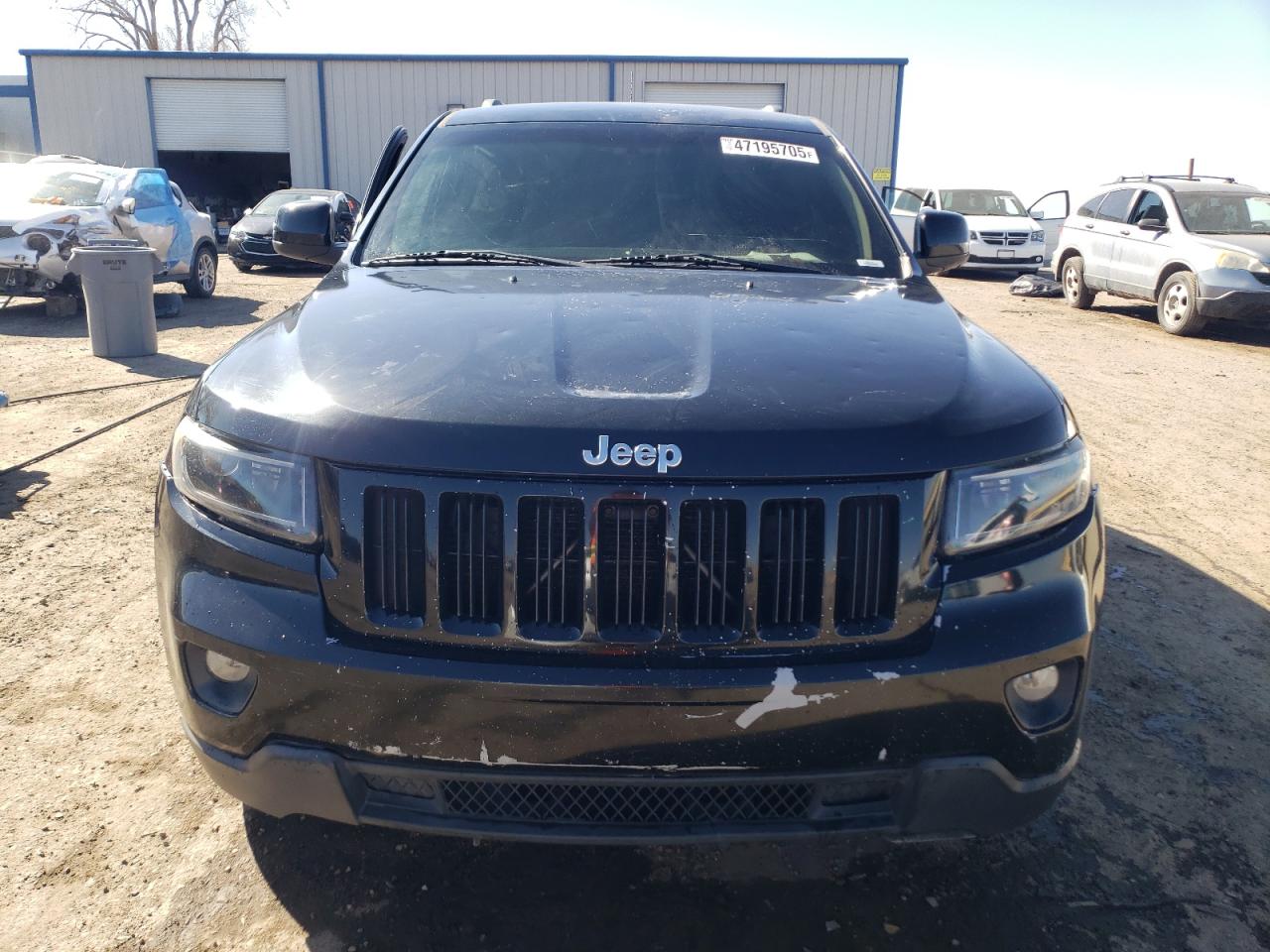 2011 Jeep Grand Cherokee VIN 1J4RR4GG5BC514557 Copart auction photo, side / front end damage thumbnail 5