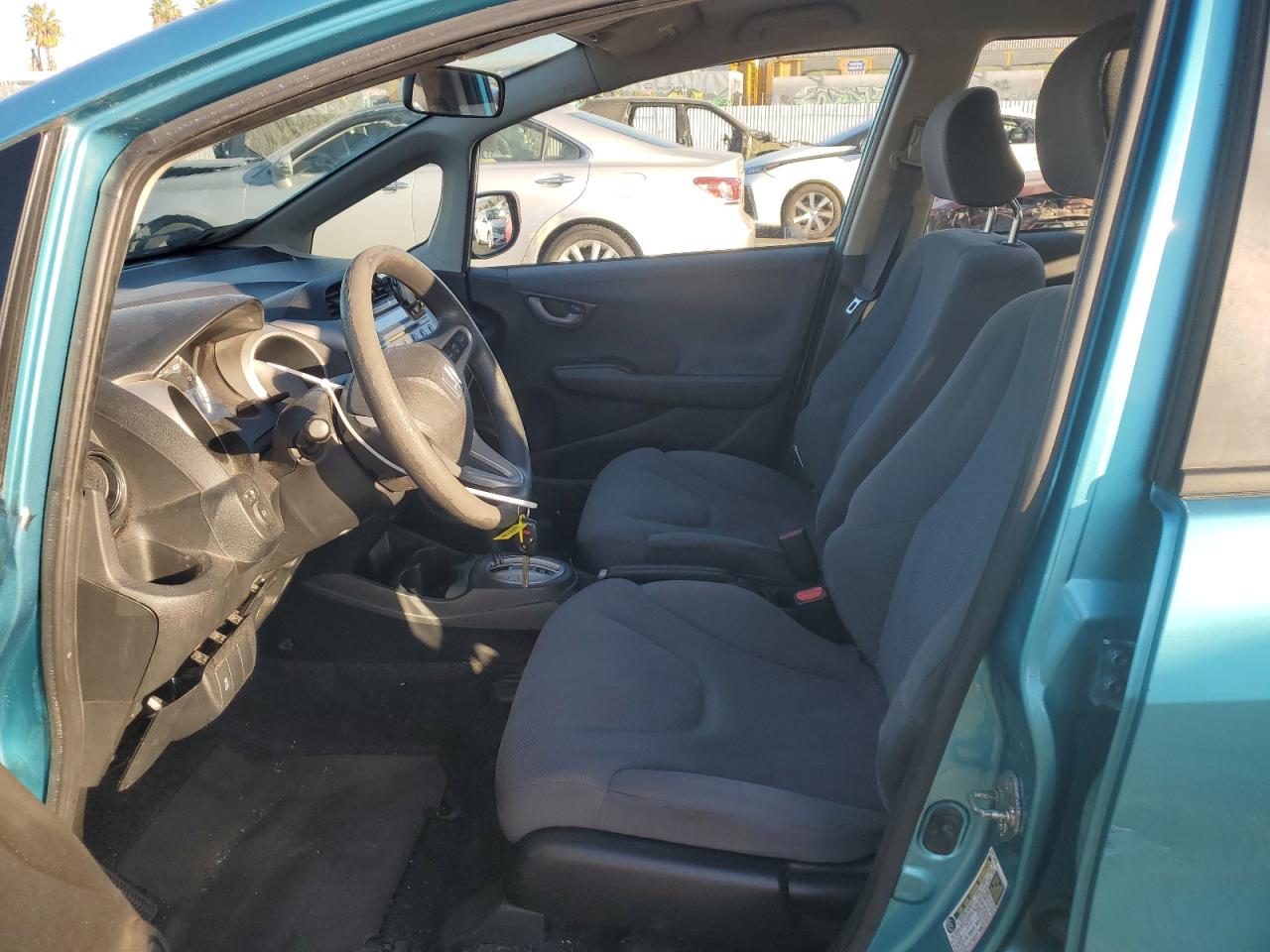 2012 Honda Fit VIN JHMGE8H39CC033609 Copart auction photo, side / front end damage thumbnail 7