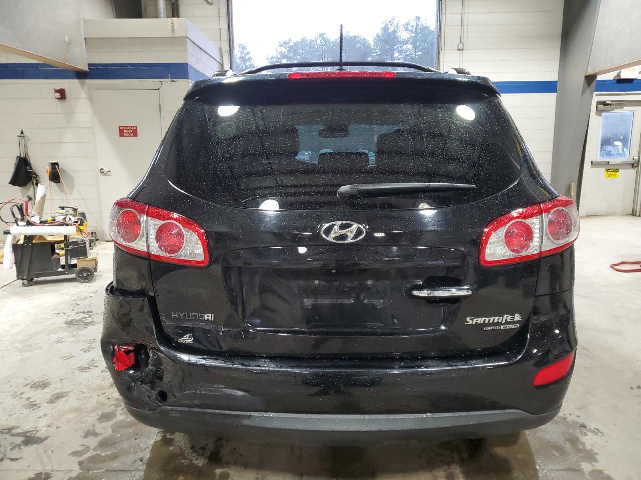 2010 Hyundai Santa Fe VIN 5NMSKDAG1AH386256 Copart auction photo, rear end damage thumbnail 6