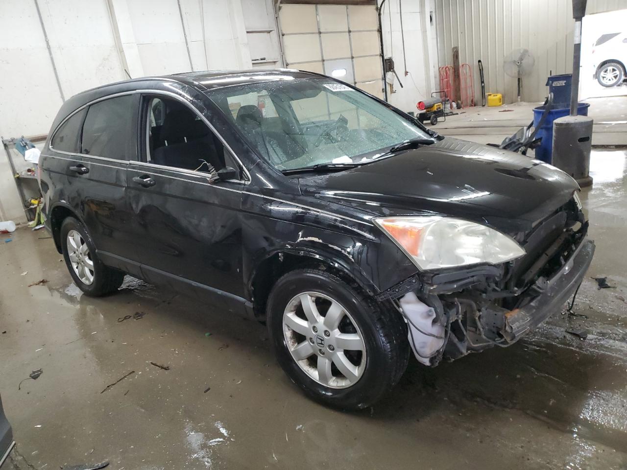 2009 Honda CR-V VIN 3CZRE48589G702862 Copart auction photo, side / front end damage thumbnail 4